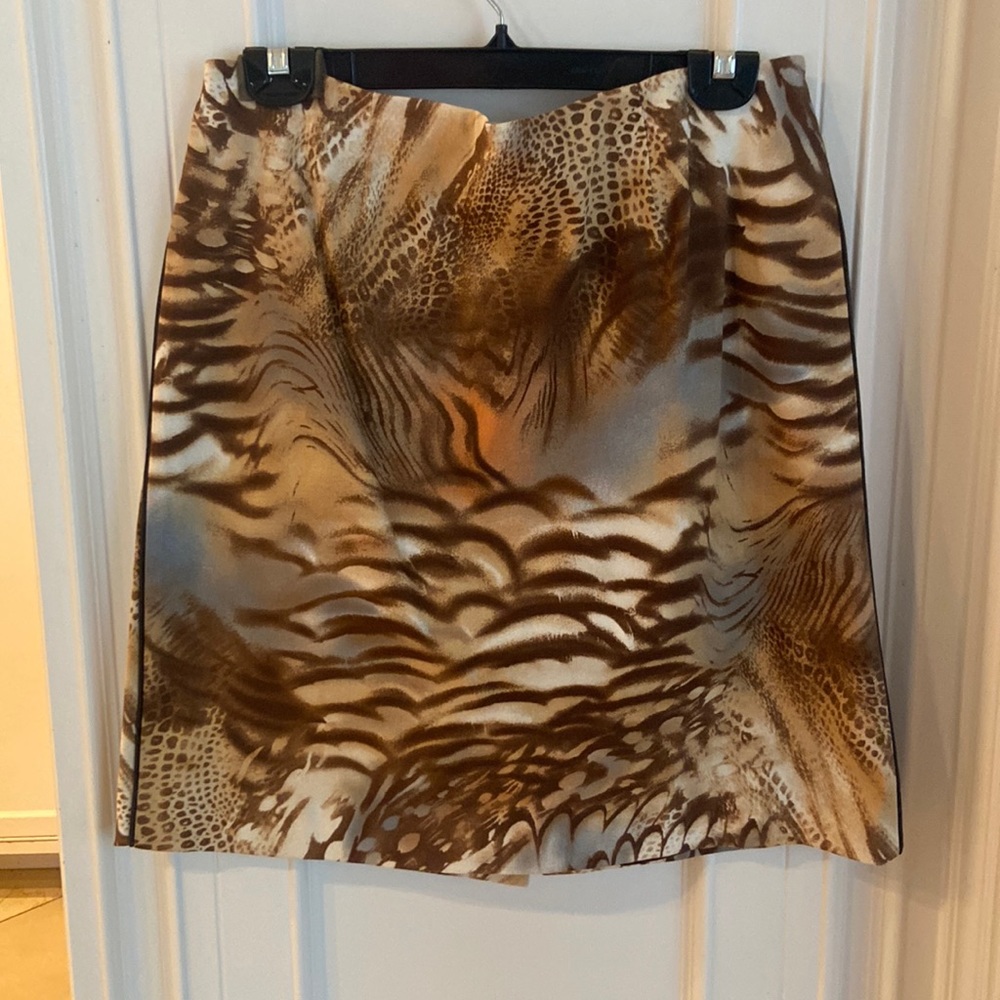 Women’s skirt, animal print, size 12, new with tags.